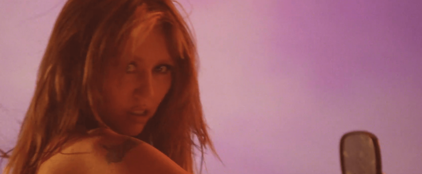 Miley Cyrus Steps Up To The Mic In The New Trailer For Her One-Night-Only Movie ‘Something Beautiful’ 6